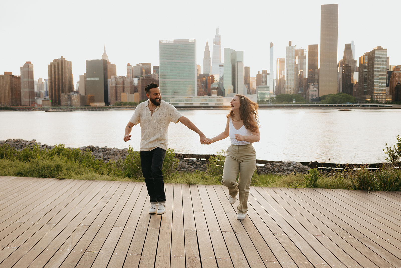 NYC Summer Engagement Session with city skyline background