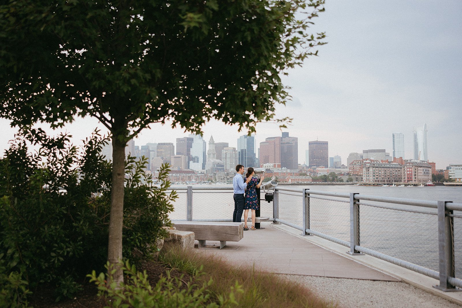 East Boston Engagement Session with the Boston city skyline in the background