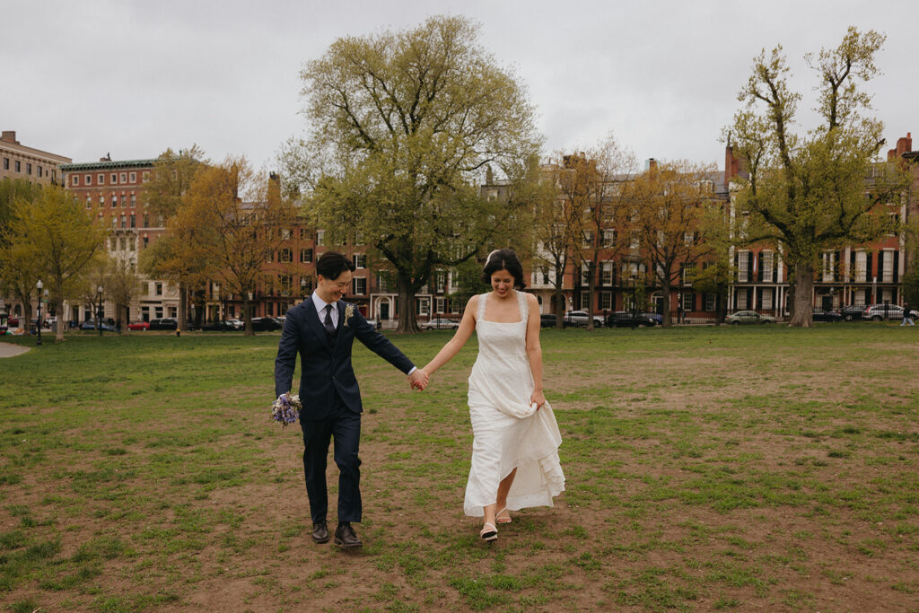 A couple taking proposal photos in the Boston Common.