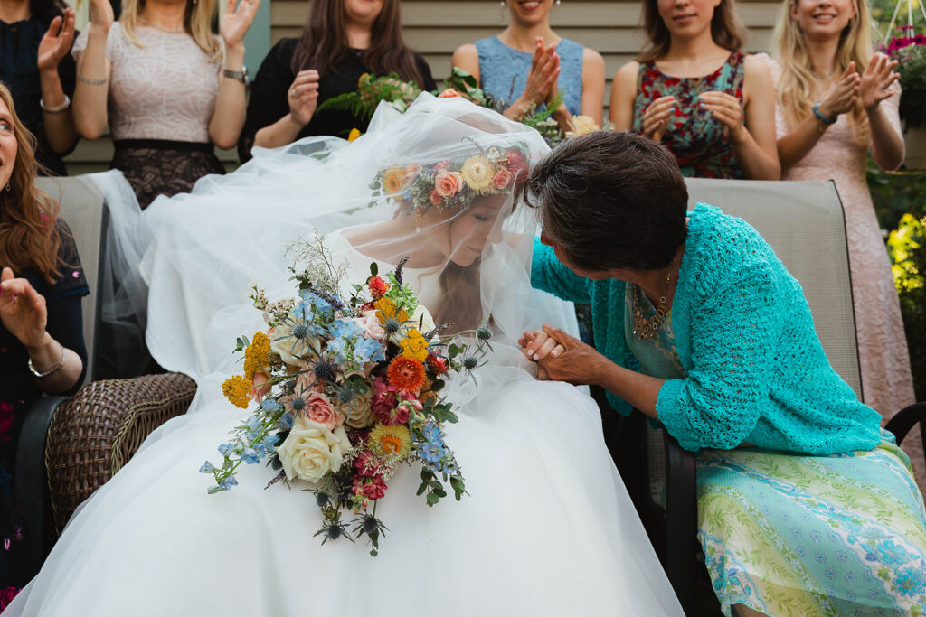 Emily & her mom before her orthodox jewish wedding ceremony in Massachusetts.