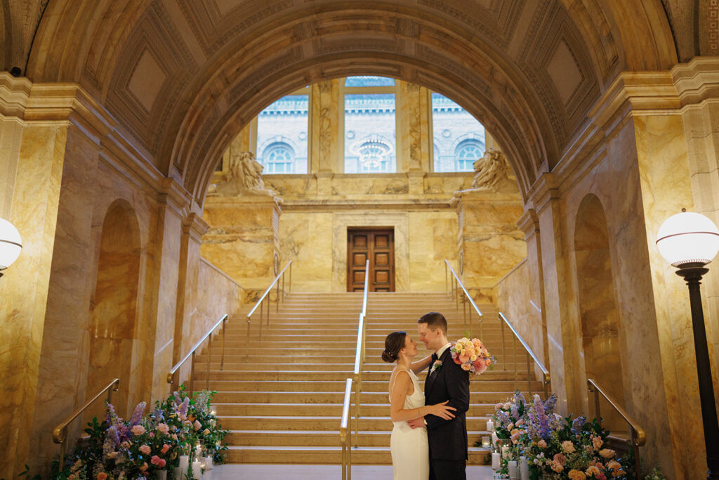 Bride & groom's wedding portraits on the famous steps of the Boston Public Library in Boston Massachusetts