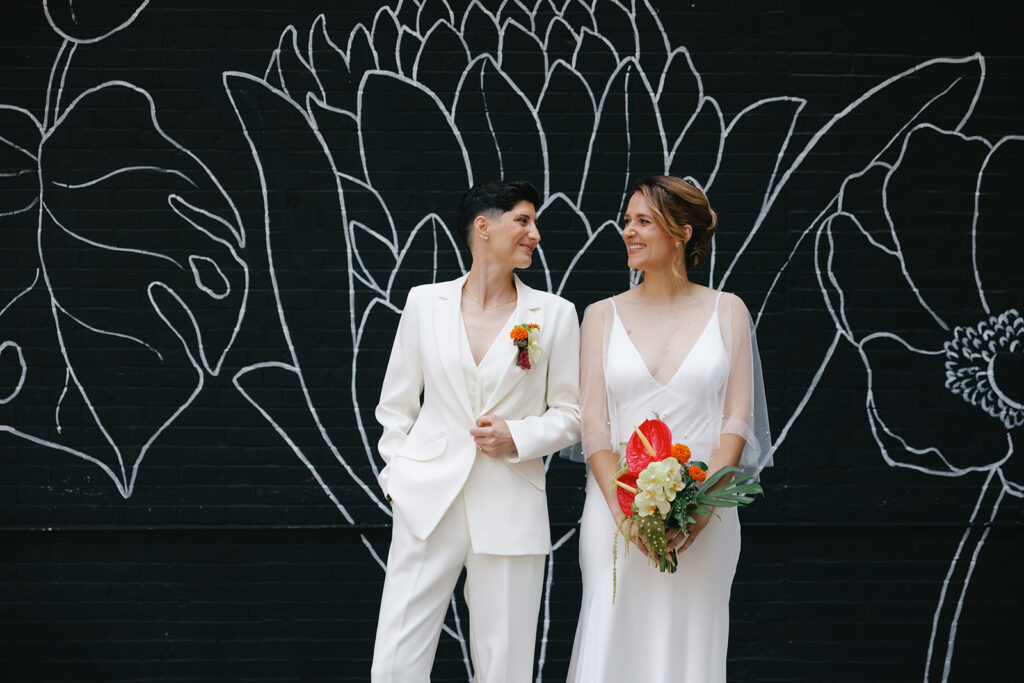 Lesbian wedding at Althea restaurant in Cambridge, Massachusetts by queer wedding photographer Lensy Michelle